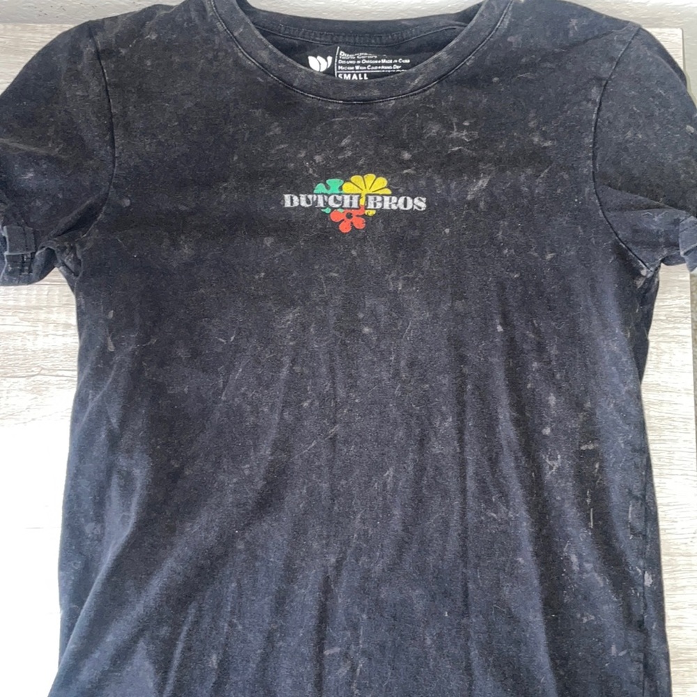 Dark washed small Dutch Bro’s Tee! Designed with florals and light colors